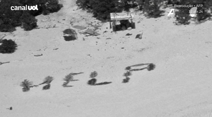 Náufragos são resgatados ao escreverem 'socorro' em praia de ilha remota